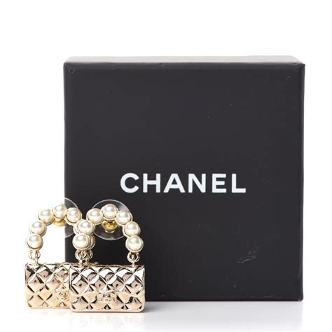 earring chanel bag